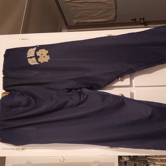 A reversible pair of 5XL Russell Athletic Notre Dame basketball warmup pants - Picture 2 of 4